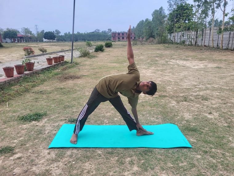 A yoga demonstration on the open campus ground at Janhit World School